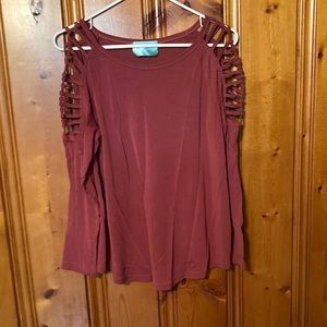 Size says small but fits like a Medium Women’s J Jordan top with bands on arms